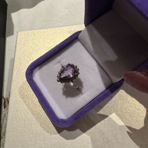 Light amethyst stone on 925 silver setting

Adjustable